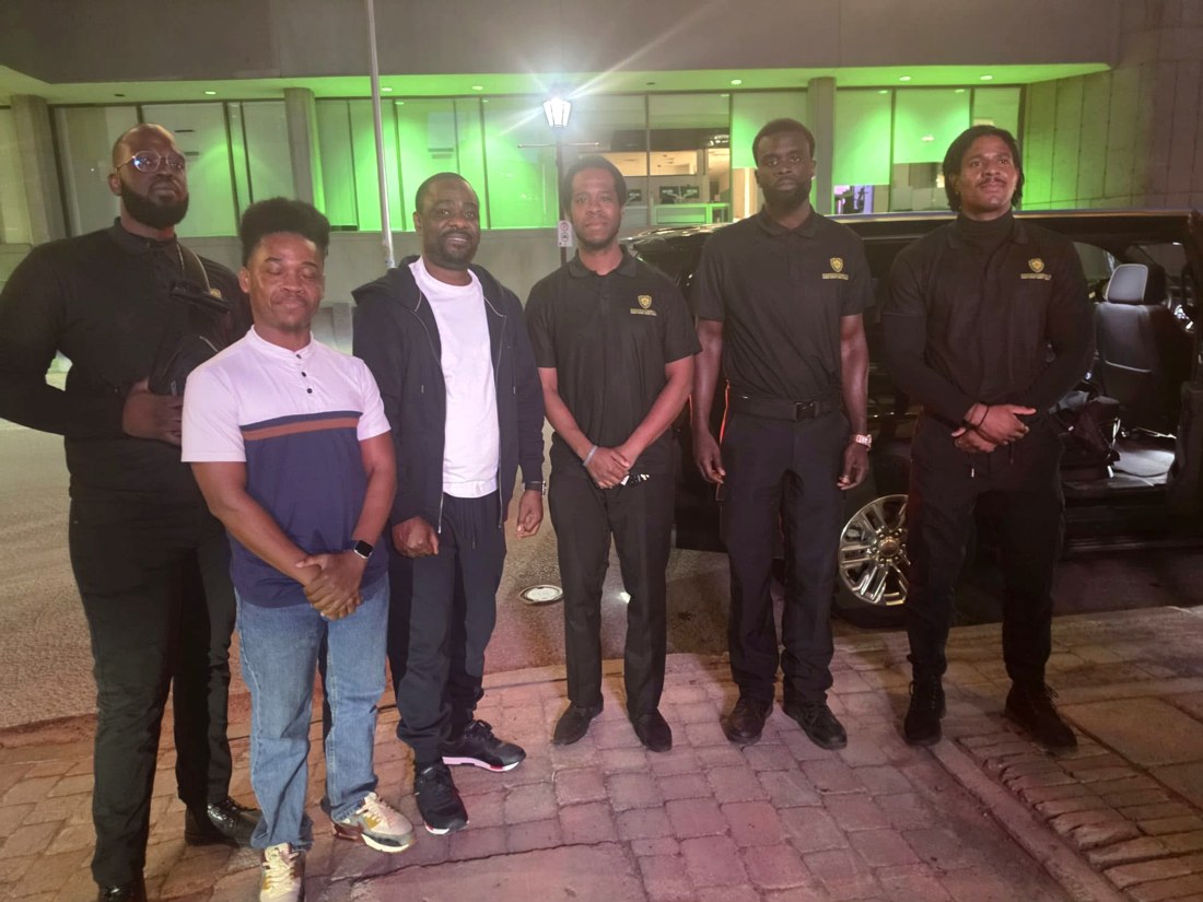 SafeHaven close protection detail escorting a client